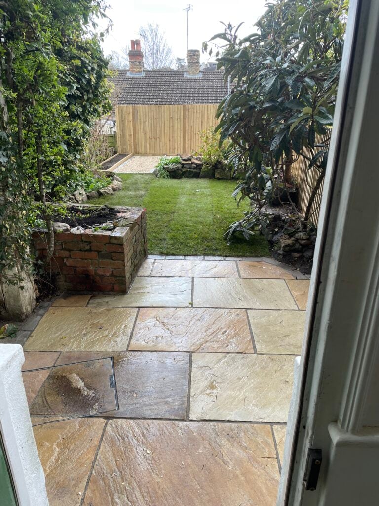 Sandstone patio and new turf